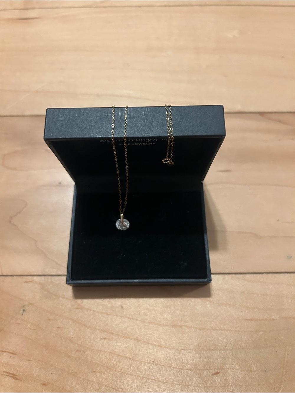 Elegant 14k Gold Necklace with Diamond-shaped pendant.